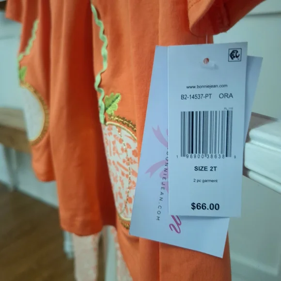Bonnie Jean Orange Pumpkin Tunic with Cream Bows & Printed Leggings - Picture 6 of 9
